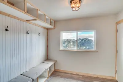 a room with white walls and a window at The View at Mountain Retreat By Red Rocks and Golden in Evergreen