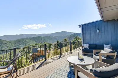 a balcony with a view of a mountain at The View at Mountain Retreat By Red Rocks and Golden in Evergreen