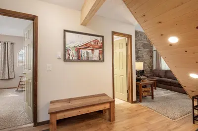 a living room with a couch and a table at Twin Rivers Vasquez 3 by Stay Winter Park in Fraser