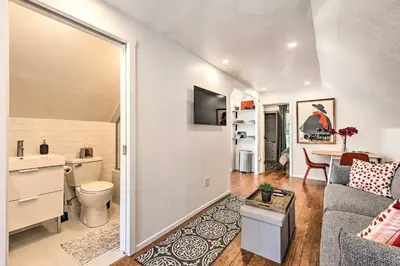 a living room with a couch and a table at 2 Mi to Downtown Denver Chic Apartment! in Denver