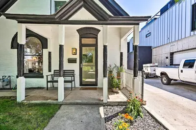 a front porch of a house with a door at 2 Mi to Downtown Denver Chic Apartment! in Denver