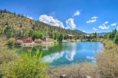 a lake in the middle of a mountain at 6 Mi to Ski Resort! Lakefront Breckenridge Cabin in Breckenridge