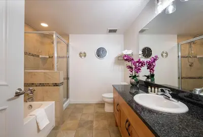 a bathroom with a sink and a toilet and a shower at Winter Park FF Premium-Rated 4470 in Winter Park