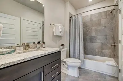 a bathroom with a sink and a toilet and a shower at Brand New Clear Water Lofts - 2br Premier Condo - Kids Ski Free, No CF condo in Keystone