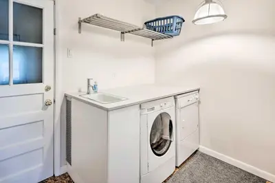 a white laundry room with a washing machine and a sink at Less Than 3 Mi to Pearl St Home with Large Yard in Boulder in Boulder