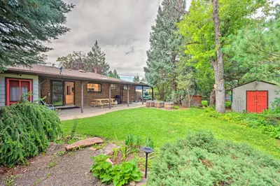 a yard with a house with a red door at Less Than 3 Mi to Pearl St Home with Large Yard in Boulder in Boulder
