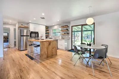 a kitchen and dining room with a table and chairs at Less Than 3 Mi to Pearl St Home with Large Yard in Boulder in Boulder