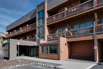 a building with balconies on the side of it at Cedar Lodge Buffalo Studio Condo: Great Frisco Location in Frisco