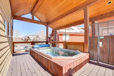 a jacuzzi tub on a screened in porch at Ski and Explore Silverthorne Gem with Hot Tub Access! in Silverthorne