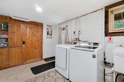a laundry room with a washer and dryer in it at Hot Tub! Pets Ok! Perfect Estes Park Getaway, Walk to Town 3 Kings!#3337 in Estes Park