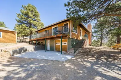 an image of a house with a balcony at Hot Tub! Pets Ok! Perfect Estes Park Getaway, Walk to Town 3 Kings!#3337 in Estes Park