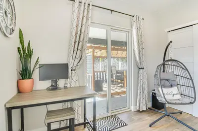 a desk with a computer and a chair in a room at Romantic Mountain Retreat with Scenic Views! in Idaho Springs
