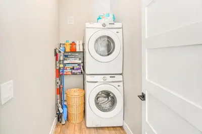 a washer and dryer in a small laundry room at Romantic Mountain Retreat with Scenic Views! in Idaho Springs