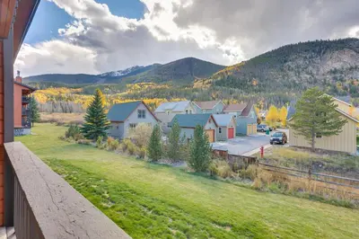 a view of a town with mountains in the background at Walkable Frisco Condo Mtn Views and Shared Hot Tub! in Frisco