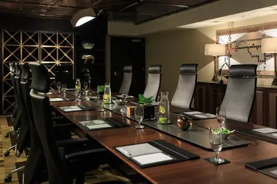 a long table in a room with chairs and a tableablish at Renaissance Denver Downtown City Center Hotel in Denver