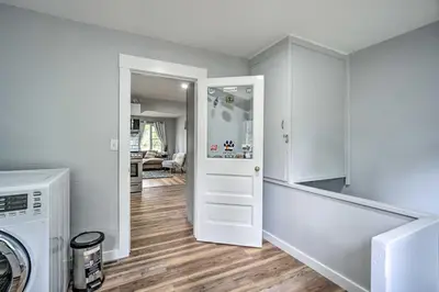 a laundry room with a washer and dryer at Charming Fort Collins Home By Old Town and CSU! in Fort Collins
