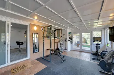 a gym with treadmills and exercise equipment in a room at Less Than 7 Mi to Dtwn Denver Home with Large Yard! in Denver
