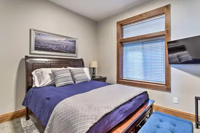 a bedroom with a bed and a window at Less Than 1 Mi to St Josephs Denver Townhome! in Denver