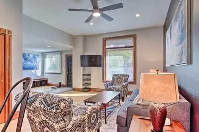 a living room with furniture and a ceiling fan at Less Than 1 Mi to St Josephs Denver Townhome! in Denver