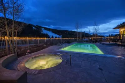 a hot tub in the middle of a patio at Red Hawk 2276 in Keystone