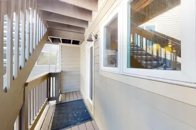 a hallway of a house with a window at Wish Upon a Morningstar in Frisco