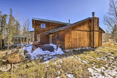 a log cabin in the woods with snow at 7 Mi to Skiing! Mtn-View Hot Tub Haven in Frisco in Frisco