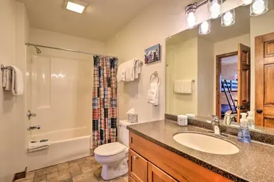 a bathroom with a sink and a toilet and a shower at Ski, Hike and Explore All-Season Frisco Condo in Frisco