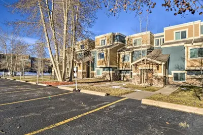 an empty parking lot in front of a house at 4 Mi to Keystone Resort Dillon Condo with Patio in Dillon