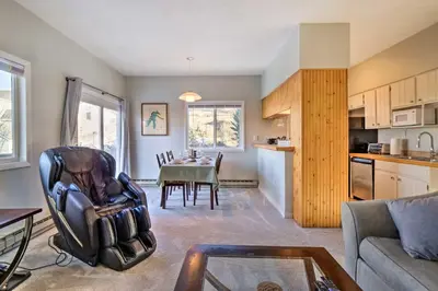 a living room with a table and a dining room at 4 Mi to Keystone Resort Dillon Condo with Patio in Dillon
