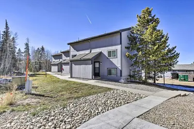 a gray house with a tree in front of it at Rocky Mtn Retreat 7 Mi to Winter Park Resort in Fraser