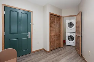 a laundry room with a washer and dryer at Zephyr Mountain Lodge Value-Rated 2508 in Winter Park