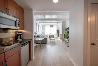 an open kitchen and living room in a apartment at Winter Park FF Premium-Rated 4564 in Winter Park