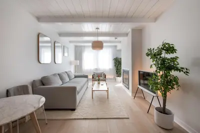 a living room with a couch and a table at Winter Park FF Premium-Rated 4564 in Winter Park