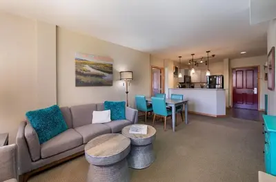 a living room with a couch and a table at Zephyr Mountain Lodge Select-Rated 2510 in Winter Park