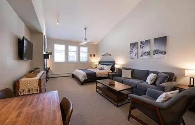 a living room with a couch and a bed at Winter Park FF Premium-Rated 4669 in Winter Park