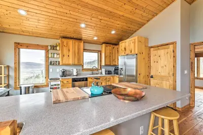 a kitchen with a counter with a bowl on it at Secluded Granby Mtn Cabin 75 Acres and Views in Granby