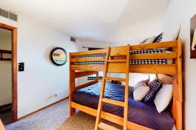 a bunk bed room with two bunk beds at Mountainside Retreat in Frisco