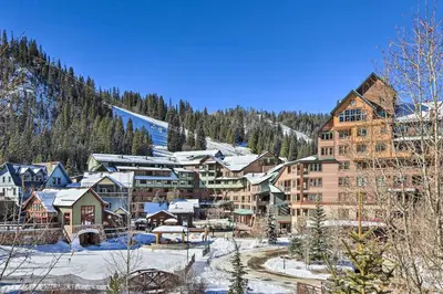 a resort in the mountains with snow on the ground at Ski-InandSki-Out Winter Park Condo with Balcony in Winter Park