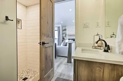 a bathroom with a sink and a shower at Chic Condo with Fireplace Walk to Main St Frisco! in Frisco
