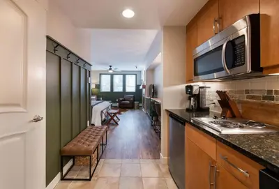 a kitchen with a counter top and a microwave at Premium Unit 3318 - Studio - Fraser Crossing Founders Pointe condo in Winter Park
