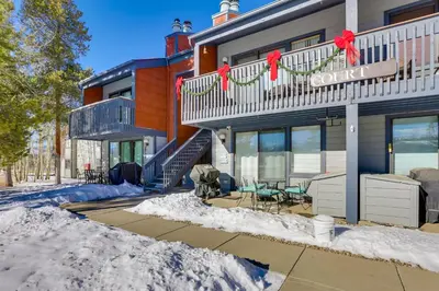a house with snow in front of it at Fraser Mountain Retreat with Community Amenities! in Fraser