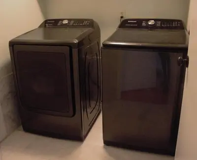 a stove and a microwave sitting next to each other at Amazing 4 Bedroom House with nice Backyard in Littleton