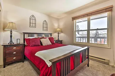 a bedroom with a large bed and a window at 3 Mi to National Park Cozy Studio in Grand Lake in Grand Lake