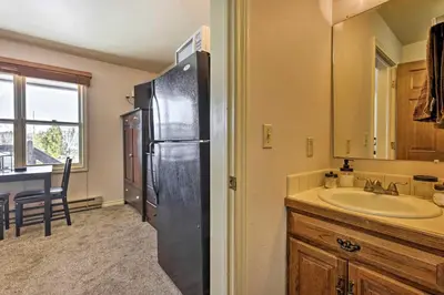 a kitchen with a sink and a black refrigerator at 3 Mi to National Park Cozy Studio in Grand Lake in Grand Lake