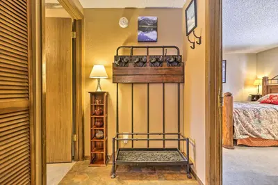 a room with a bedroom with a bed and a room with a bed at Gorgeous Winter Park Condo with Private Deck! in Winter Park