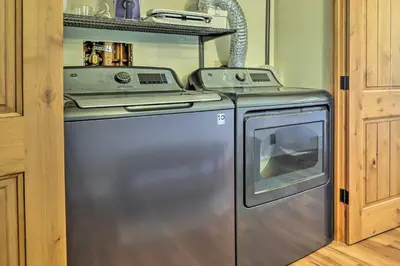 a kitchen with a stainless steel dishwasher with a stove at MtnandLake Views and 3 Mi to Skiing Dillon Condo in Dillon