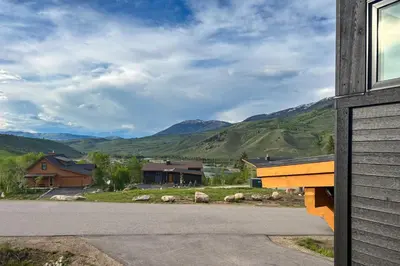 a building with a view of a mountain at A Slice of Silverthorne in Silverthorne