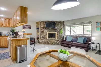 a living room with a couch and a fireplace at 6 Mi to Keystone Resort Cozy Lake Dillon Condo! in Dillon