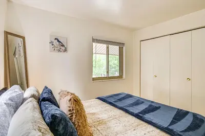 a bedroom with a bed and a window at 6 Mi to Keystone Resort Cozy Lake Dillon Condo! in Dillon