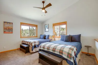 a bedroom with two beds and a ceiling fan at Steps to Grand Lake New Deck at The Innlet Condo in Grand Lake